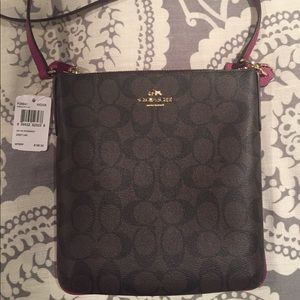 Coach purse. 8” x 9”